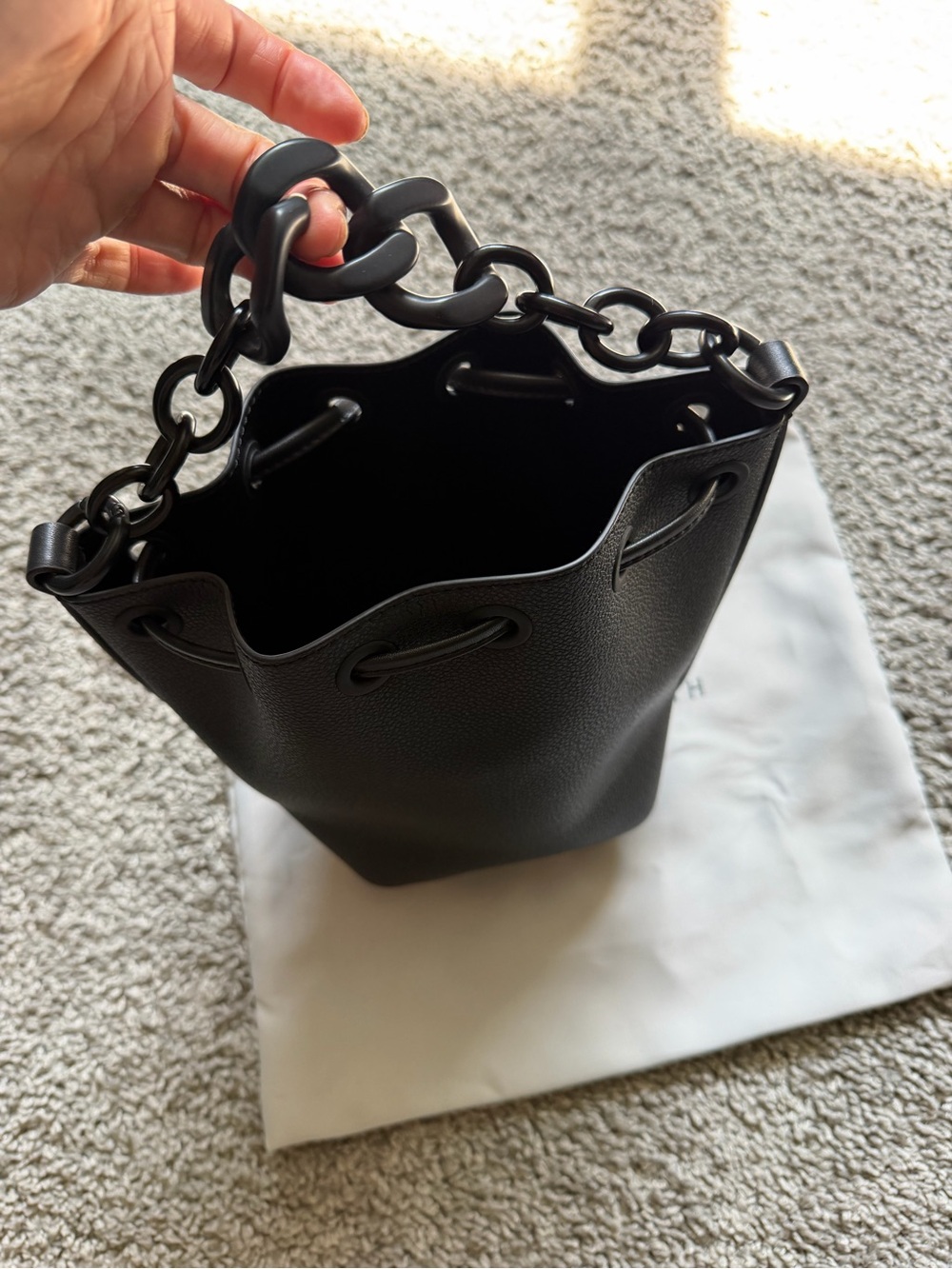 Charles & Keith Black Leather Bucket Bag with Chain Handle and Adjustable Strap